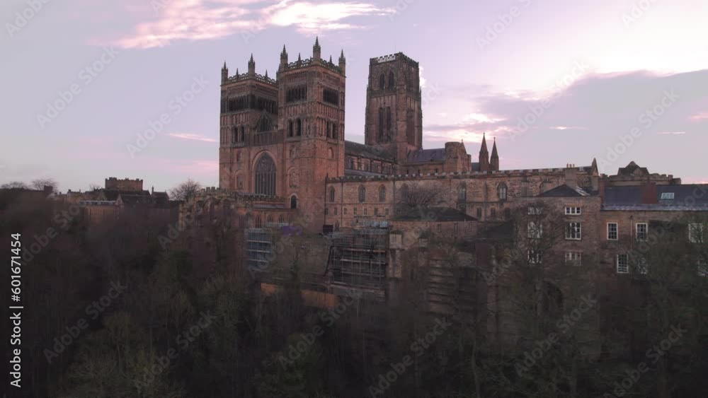 Drone tracks fast around Durham Cathedral at medium height on a winter morning Drone tracks fast around Durham Cathedral at medium height on a winter morning