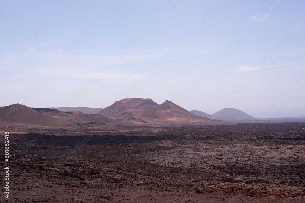 Amazing lunar landscape of Timanfaya National Park on the volcanic island of Lanzarote in Spain.