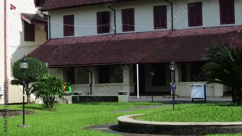 Fort Rotterdam which is located in Makassar City, South Sulawesi. visitors passing by in the old building, the museum of struggle. photo