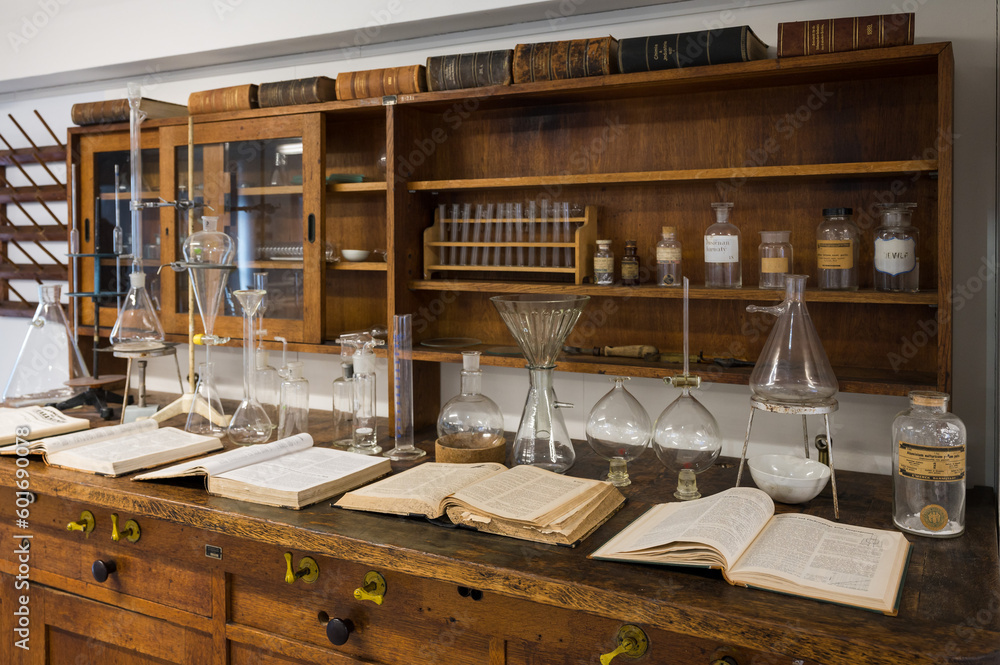 Old chemistry lab with books and test tubes