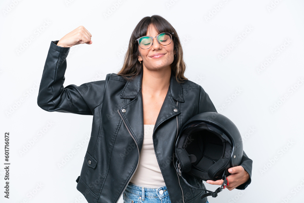 Young caucasian woman with a motorcycle helmet isolated on white background doing strong gesture Young caucasian woman with a motorcycle helmet isolated on white background doing strong gesture