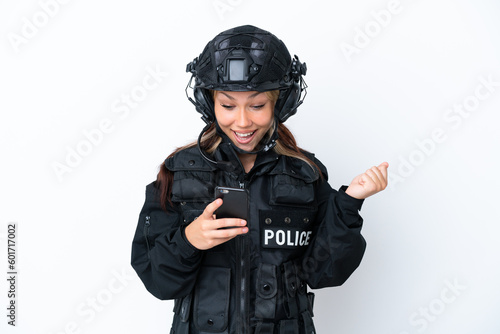 SWAT Russian woman isolated on white background surprised and sending a message