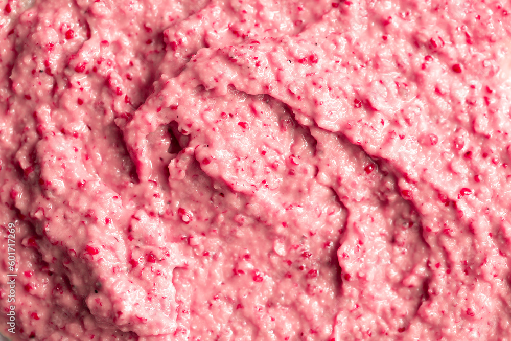Berry yoghurt ice cream. Smoothies from fresh fruits and berries. Ice cream texture. Delicious sweet dessert close-up as a background. Berry yoghurt ice cream. Smoothies from fresh fruits and berries. Ice cream texture. Delicious sweet dessert close-up as a background.