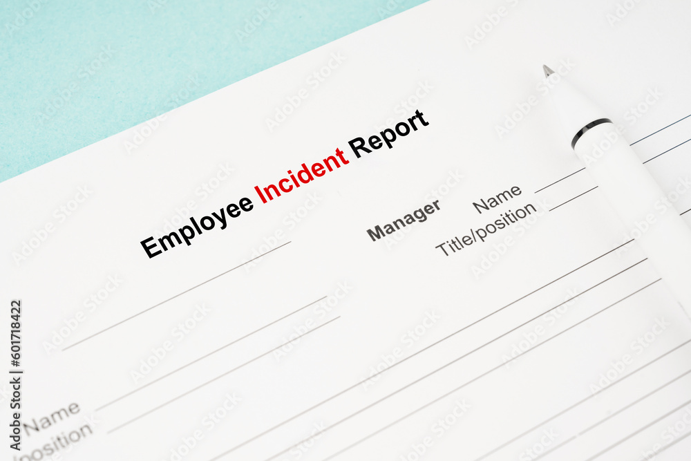 The Template of an Employee incident report form document and and pen on blue background. The Template of an Employee incident report form document and and pen on blue background.