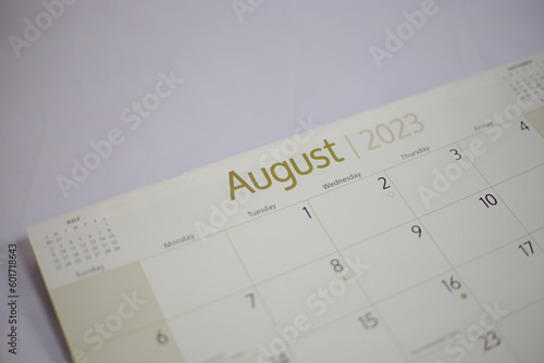 Top view of a closeup calendar of August 2023. Selective focus shot of a calendar on august page. 