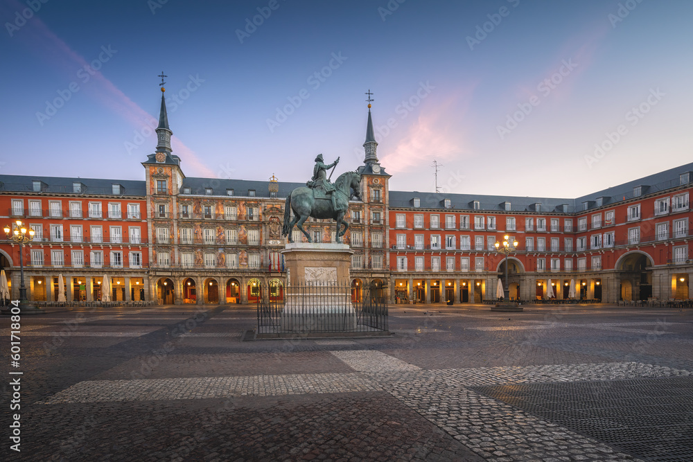 Plaza Mayor at sunrise with King Philip III (Felipe III) statue - Madrid, Spain