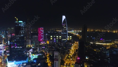 Wallpaper Mural HOCHIMINH, VIETNAM - MAY, 2023: Aerial drone night city of Ho Chi Minh City (Saigon) Vietnam skyline at night from above. Torontodigital.ca