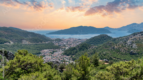 Fototapeta Naklejka Na Ścianę i Meble -  Marmaris town panoramic view in Mugla, Turkey. Marmaris is a popular resort town located on the southwestern coast of Turkey, known for its beautiful beaches, turquoise waters, and lively nightlife.