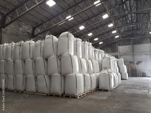 Chemical fertilizer The product stock is packed in sacks, stacked in the warehouse, waiting for delivery.