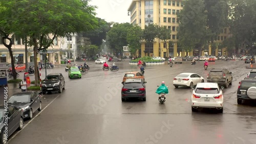 Wallpaper Mural HANOI, VIETNAM - MAY, 2023: Drone aerial view Vietnam Hanoi city streets from above at rainy day. Torontodigital.ca