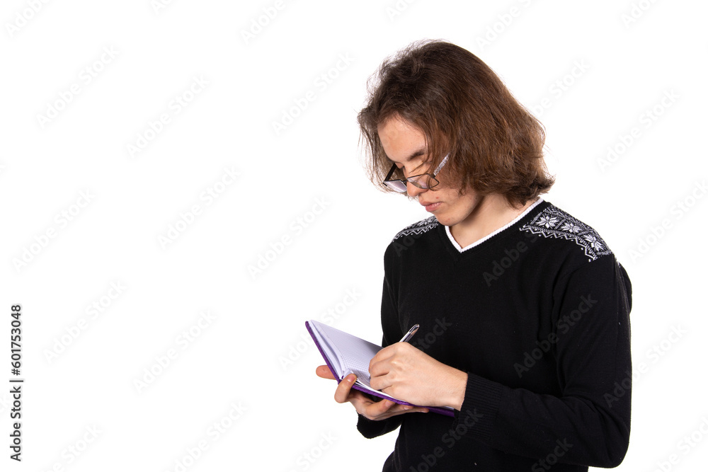 Young attractive student posing in the studio. Young attractive student posing in the studio.