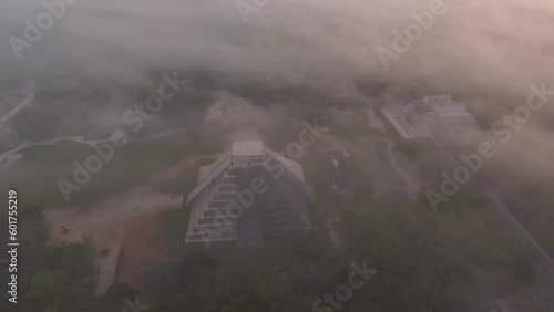 Aerial Drone View Yucatan Chichen Itza Mayan Pyramids Ruins at Sunrise Fog Mexico photo