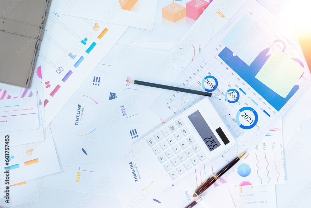 business desk with keyboard report chart pen and tablet on white table business desk with keyboard report chart pen and tablet on white table