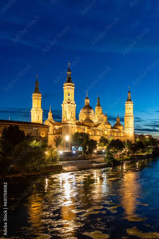  ebro river, in front of the Basilica del Pilar, with very low water level due to drought and climate change in Zaragoza, Spain