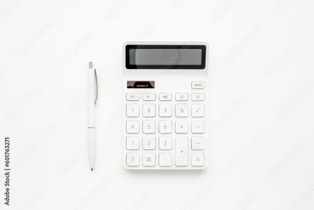 Taxes calculation and financial accounting concept with calculator Taxes calculation and financial accounting concept with calculator