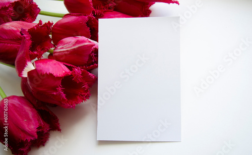 Greeting, postcard, birthday, wedding invite mock up white card with the bouquet of pink tulips