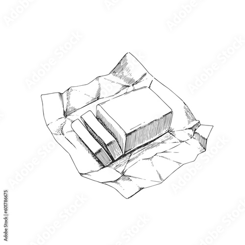 Vector hand-drawn illustration of sliced butter on wrapping paper isolated on white. Sketch of natural dairy product in engraving style.