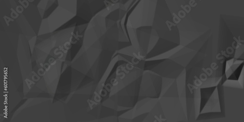Abstract background of crumpled black paper. Black paper sheet texture background. Can use text banners products or business cards your.	
