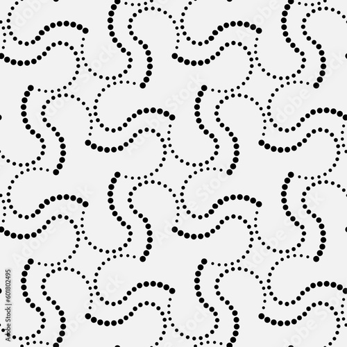 Vector seamless models. The composition of regularly repeating points, circles. Monochrome, simple.