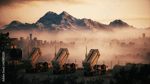 Air defense battery on the city background photo