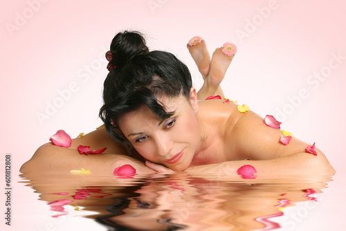 A beautiful woman with peaceful reflections. Suitable for blissful retreats, holistic services, wellness therapies, beauty rituals, rejuvenation or spa treatments.