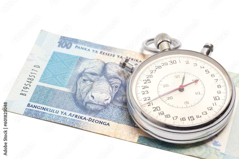 Time is money concept, stopwatch on South African money 100 rand banknote. Time is money concept, stopwatch on South African money 100 rand banknote.