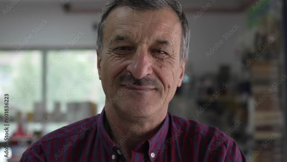 Portrait of one senior caucasian man with mustaches stand indoor Portrait of one senior caucasian man with mustaches stand indoor