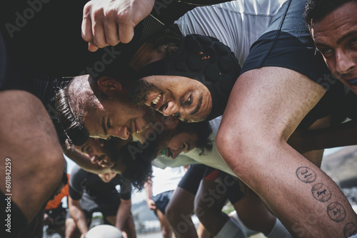 Fitness, rugby and team in a scrum on a field during a game, workout or training in a stadium. Sports, performance and group of athletes in position on an outdoor pitch for a match or practice.