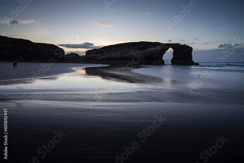Beach of the Cathedrals in Ribadeo, Lugo, Galicia. Also called Augas Santas beach. Cliffs and stone arches. nature monument. photo