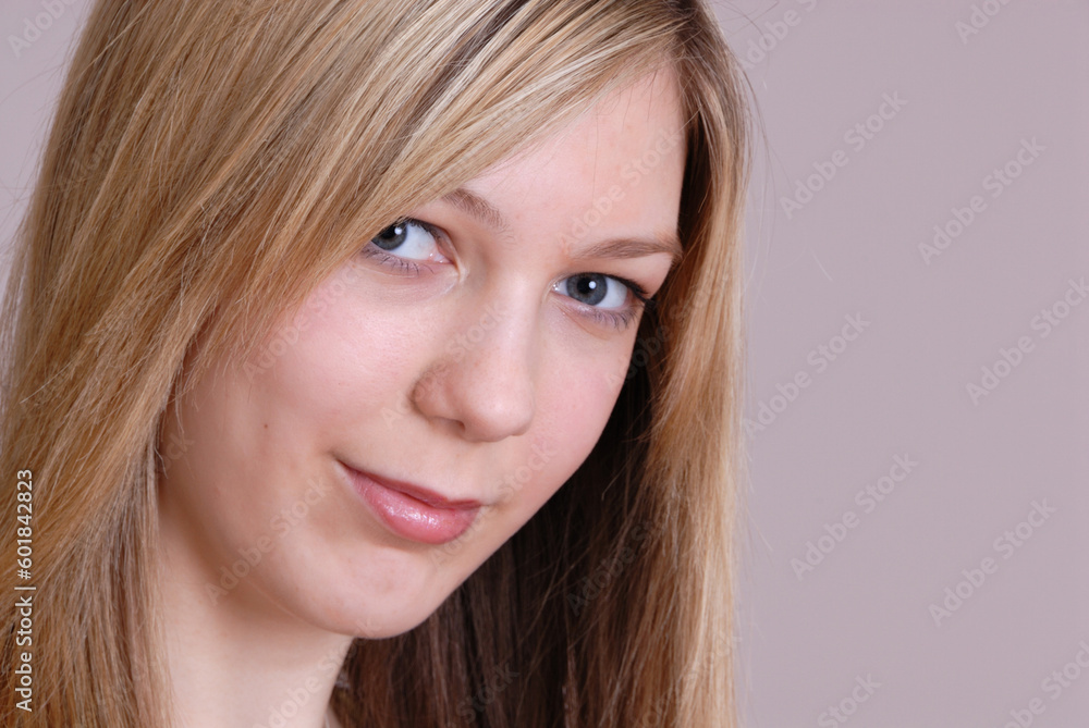 thoughtful pretty young blonde teenage girl in modern home thoughtful pretty young blonde teenage girl in modern home