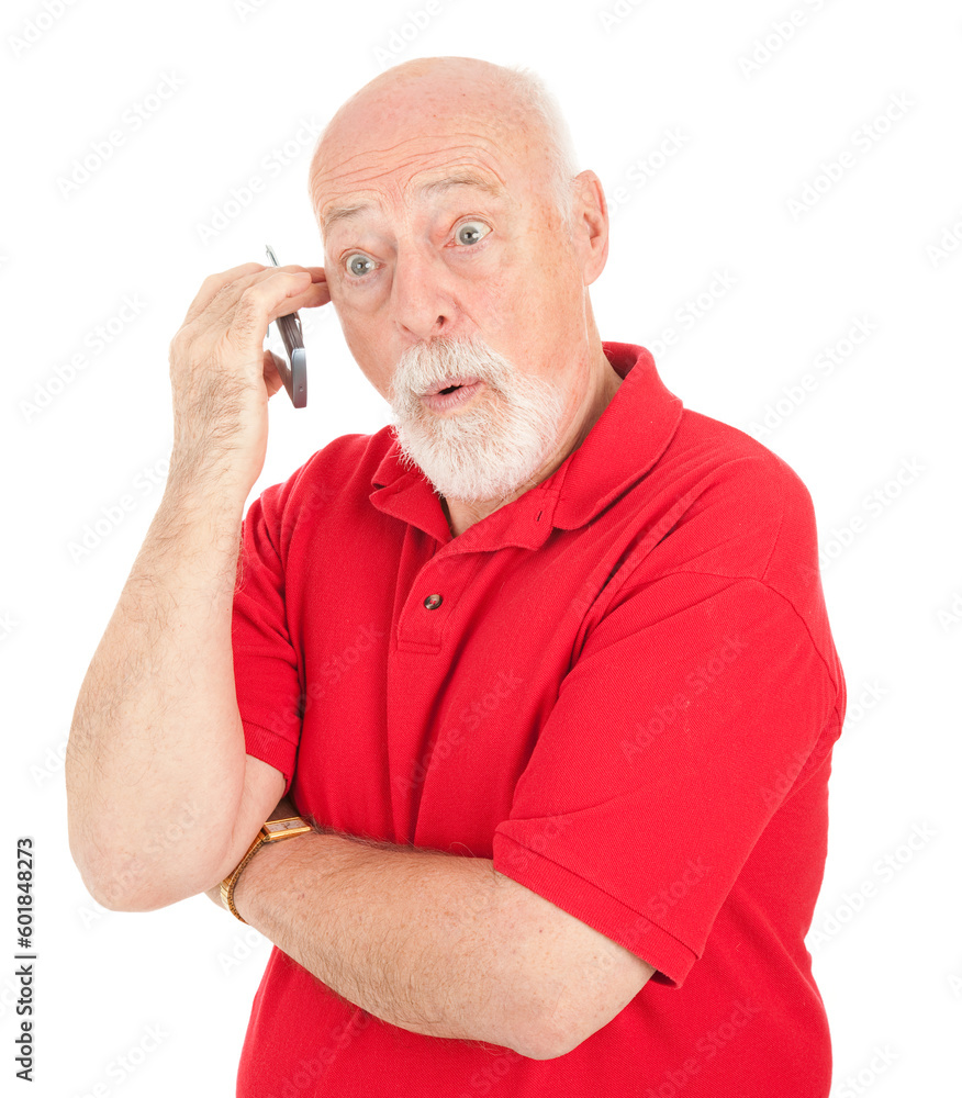Surprised senior man talking on his cell phone. Isolated on white. Surprised senior man talking on his cell phone. Isolated on white.