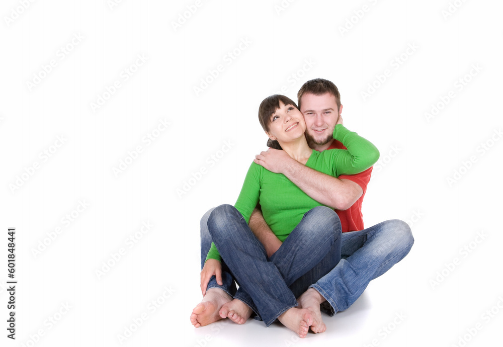 young loving couple together on white background