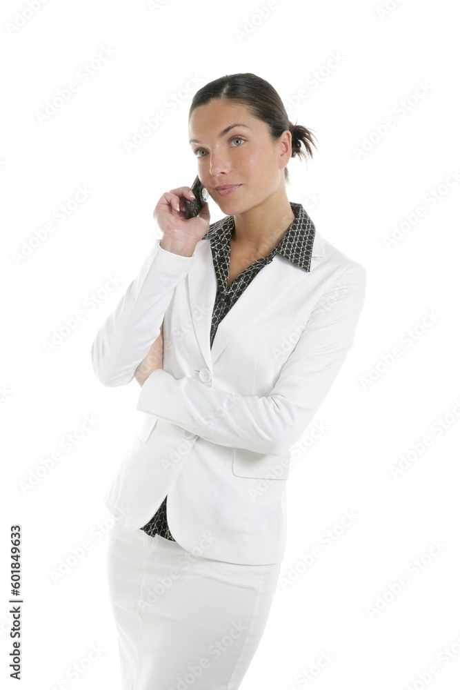Beautiful businesswoman talking mobile phone over white Beautiful businesswoman talking mobile phone over white