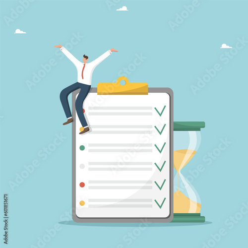 Time management and business planning, successful completion of tasks and assignments, meeting deadlines, hard work to achieve career heights, a man shouts cheers on a tablet with all completed tasks.