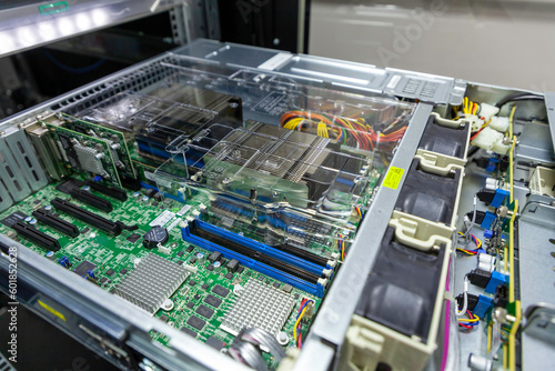 Inside view of opened multiprocessor server in rack frame of IT datacenter.