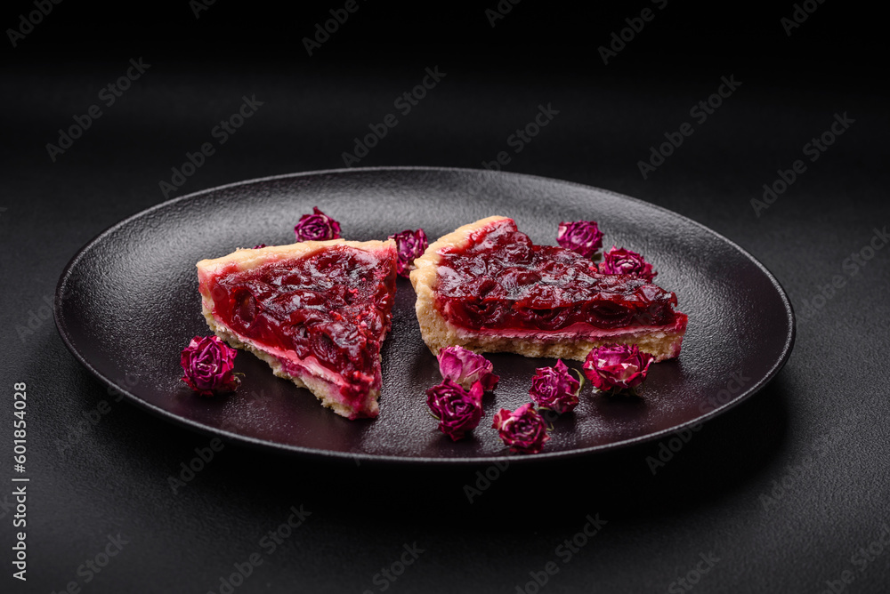 Delicious fragrant sweet pie with cherry berries on a ceramic plate Delicious fragrant sweet pie with cherry berries on a ceramic plate