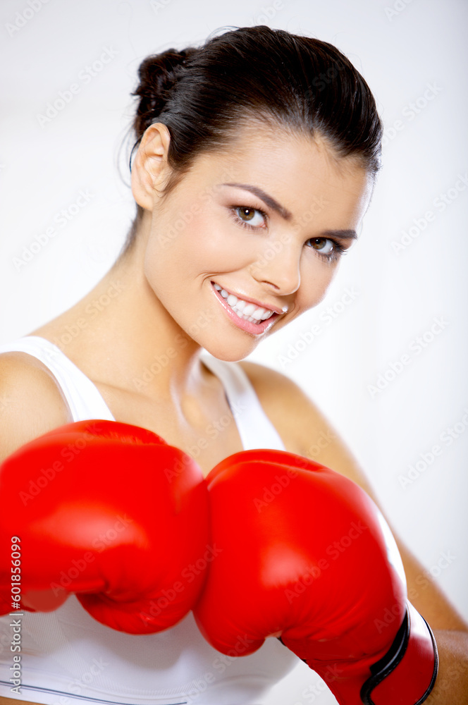 Young beautiful woman during fitness time and boxing Young beautiful woman during fitness time and boxing