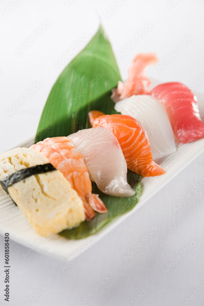 sushi plate with tofu, prawn ,king fish,salmon,octopus and tuna sushi plate with tofu, prawn ,king fish,salmon,octopus and tuna