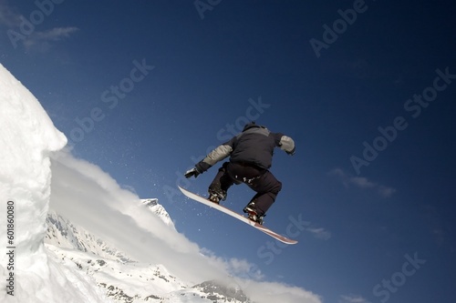 snowboarder jumping high in the air