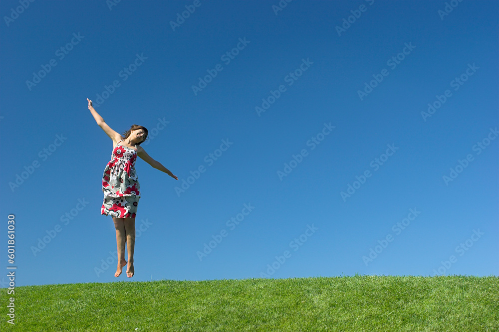 Happy woman having fun on a beautiful green meadow Happy woman having fun on a beautiful green meadow