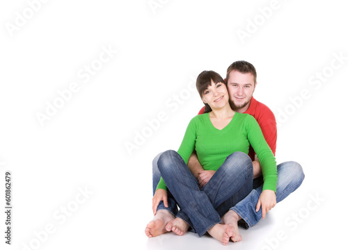 young loving couple together on white background
