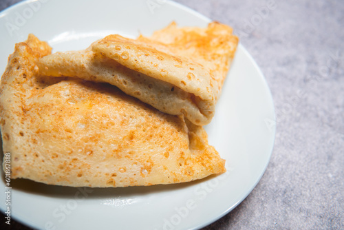 flat lay photo showing pancakes on a plate