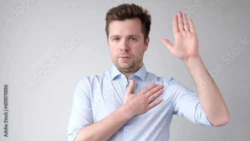 Konstfotografi The European young man takes an oath to speak only the truth
