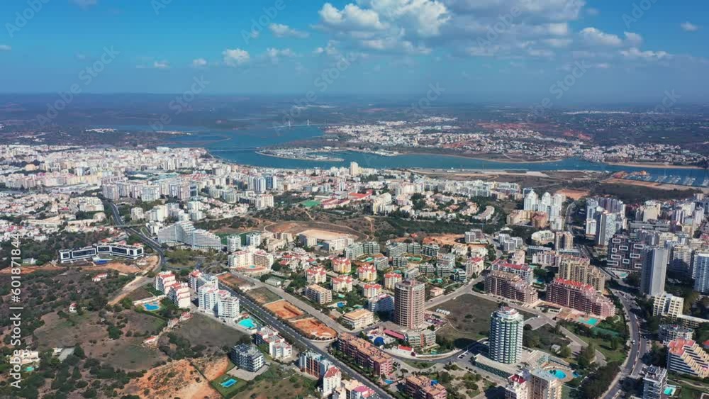 Tourist Portuguese city of Portimao aerial view on a sunny day. South Portugal Algarve. Northern part of the city Tourist Portuguese city of Portimao aerial view on a sunny day. South Portugal Algarve. Northern part of the city