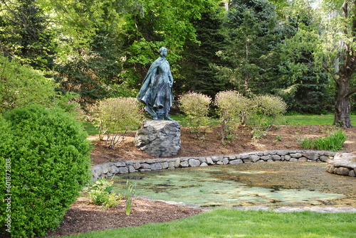 Pilgrim Maiden statue next to her pond in Brewster Gardens. Plymouth, MA.