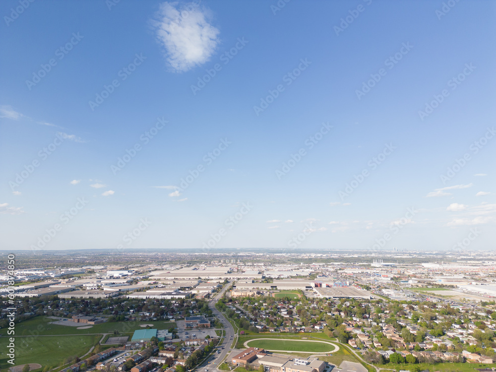 Drone view, sun-drenched Brampton real estate, lush green yards, picturesque houses off Bramalea-Mayfield. Summer in Ontario at its best Drone view, sun-drenched Brampton real estate, lush green yards, picturesque houses off Bramalea-Mayfield. Summer in Ontario at its best