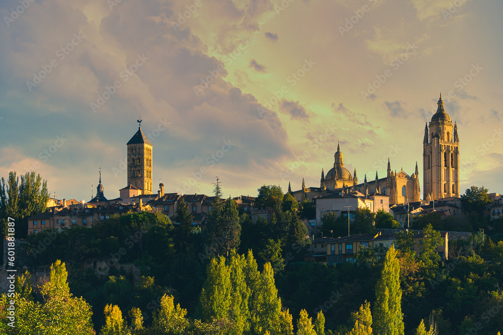 View of the bell towers of old churches in Segovia (Spain) at sunset
