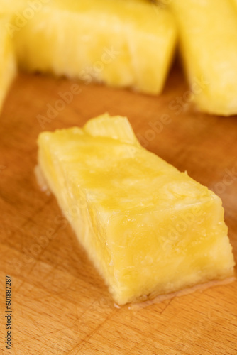 ripe yellow pineapple cut into pieces