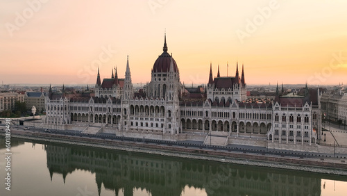 Amazing Skyline Establishing Bird Eye Aerial View Shot of Budapest city. Hungarian Parliament Building with the Danube river at sunrise. Hungary