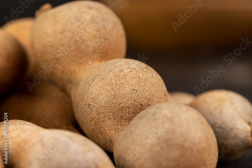 long ripe tamarind pods close up